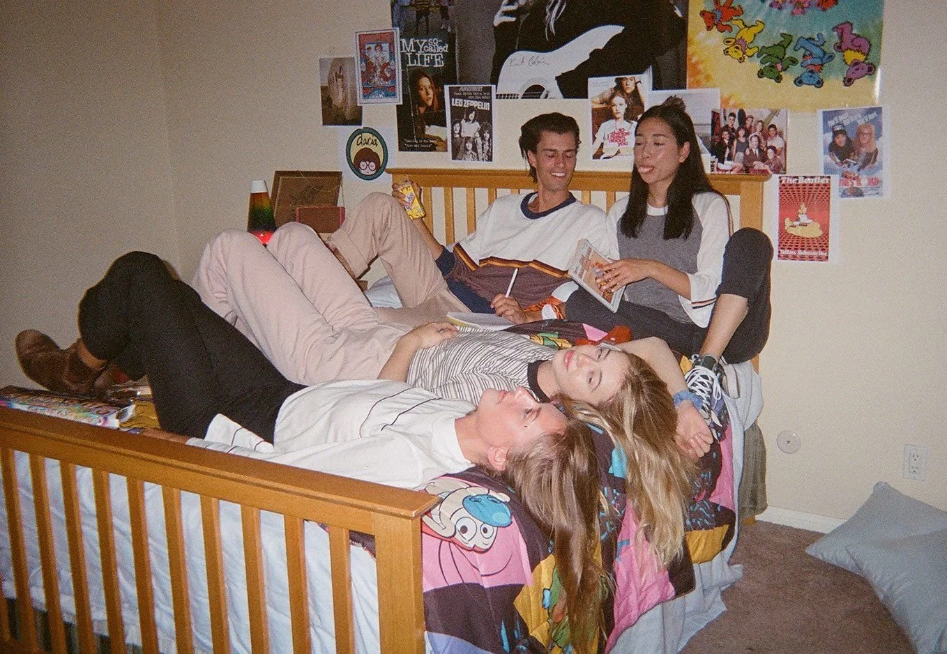 Young adults lounging with posters