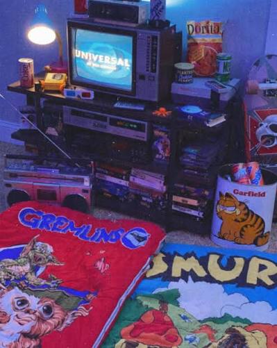 80s TV setup with character sleeping bags